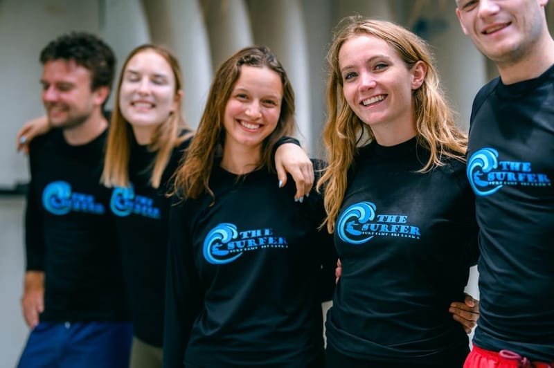 The Surfer team in branded t-shirts at the camp in Weligama, Sri Lanka